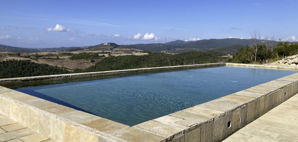 Alabaster boulders around the pool perimeter