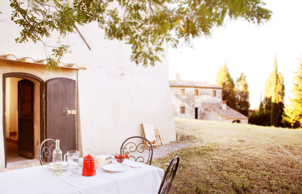 Interior of La Scuola — the living room with fireplace
